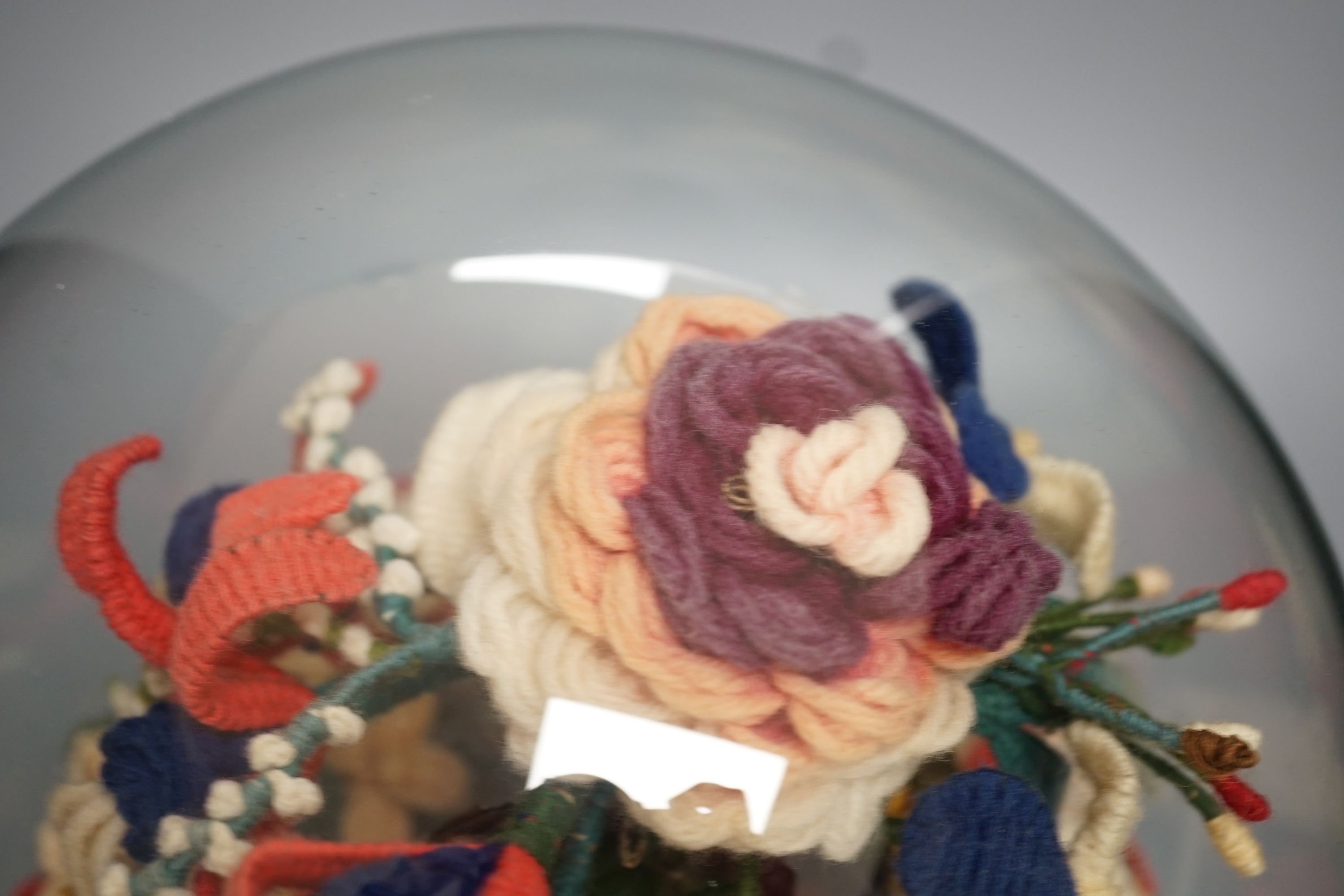 Victorian woolwork model of a bouquet of flowers under a glass dome - 40cm high